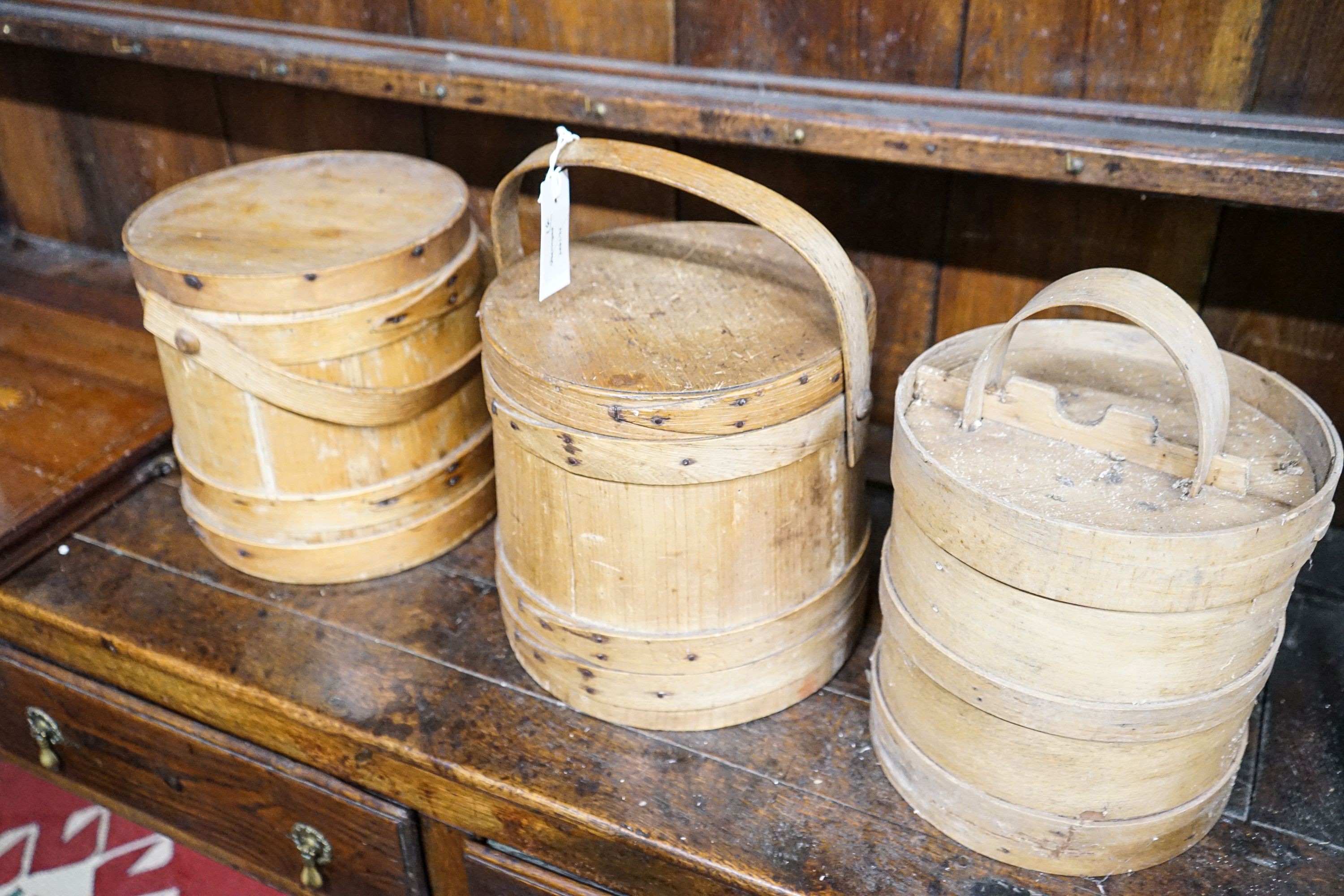 Three wooden butter pails and an Edwardian inlaid walnut tray, width 54cm